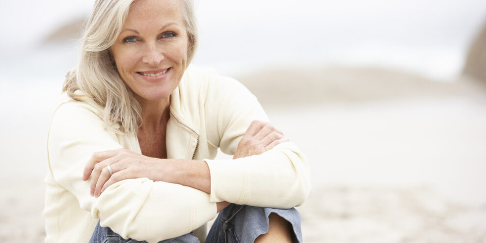 older woman on beach