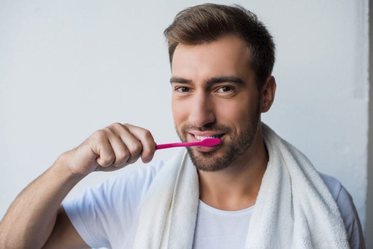 Man brushing teeth - Duncan OK Dentist