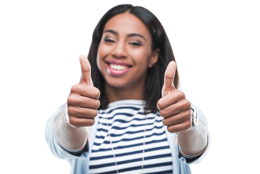 young-woman-smiling-and-giving-two-thumbs-up-duncan-ok-dentist