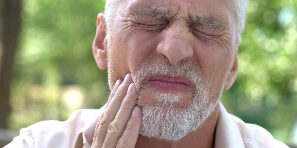 man with toothache