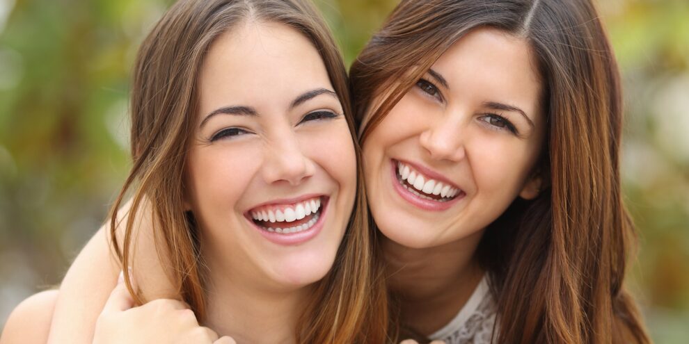 Two women smile after visiting a trusted Duncan, OK, dental service