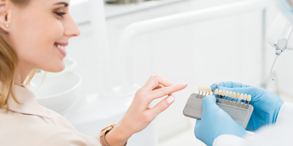 Woman choosing dental implant