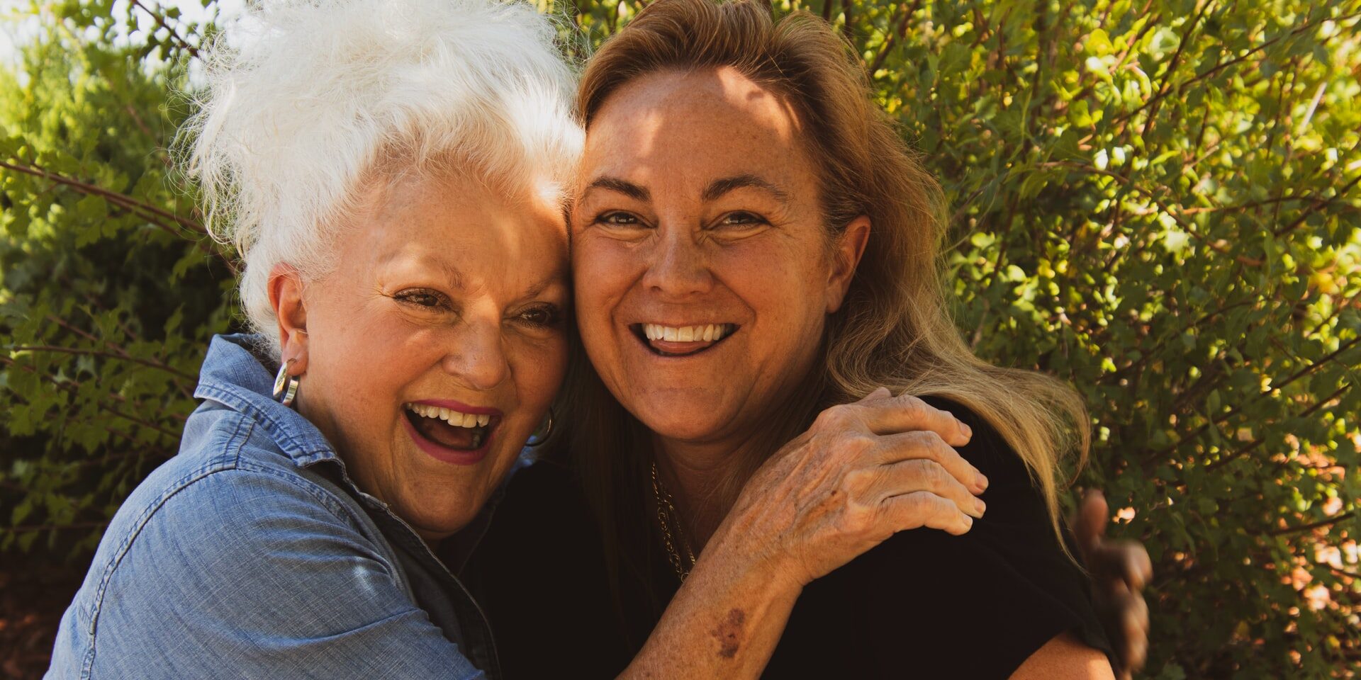 two women laughing-dentures