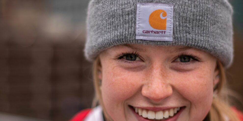 Smiling teen girl wearing a hat