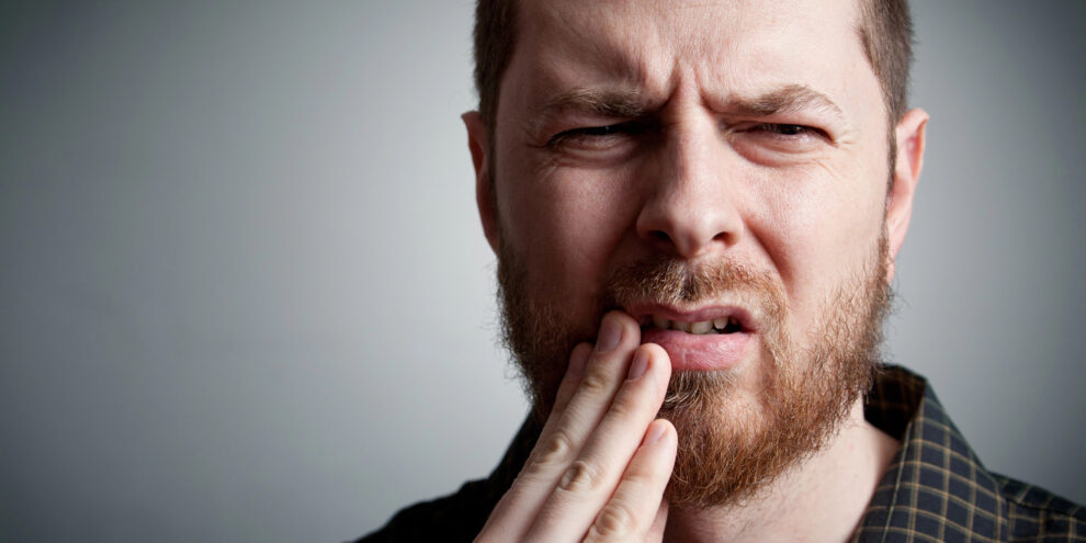man with a toothache