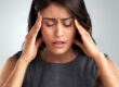 female professional with tmd headache pain