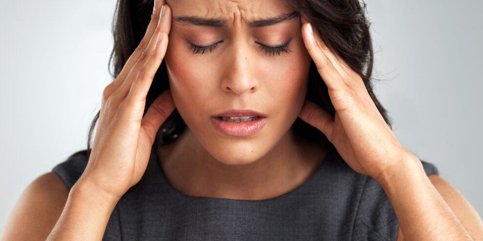 female professional with tmd headache pain