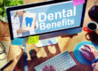 dental benefits on computer screen with sticky notes